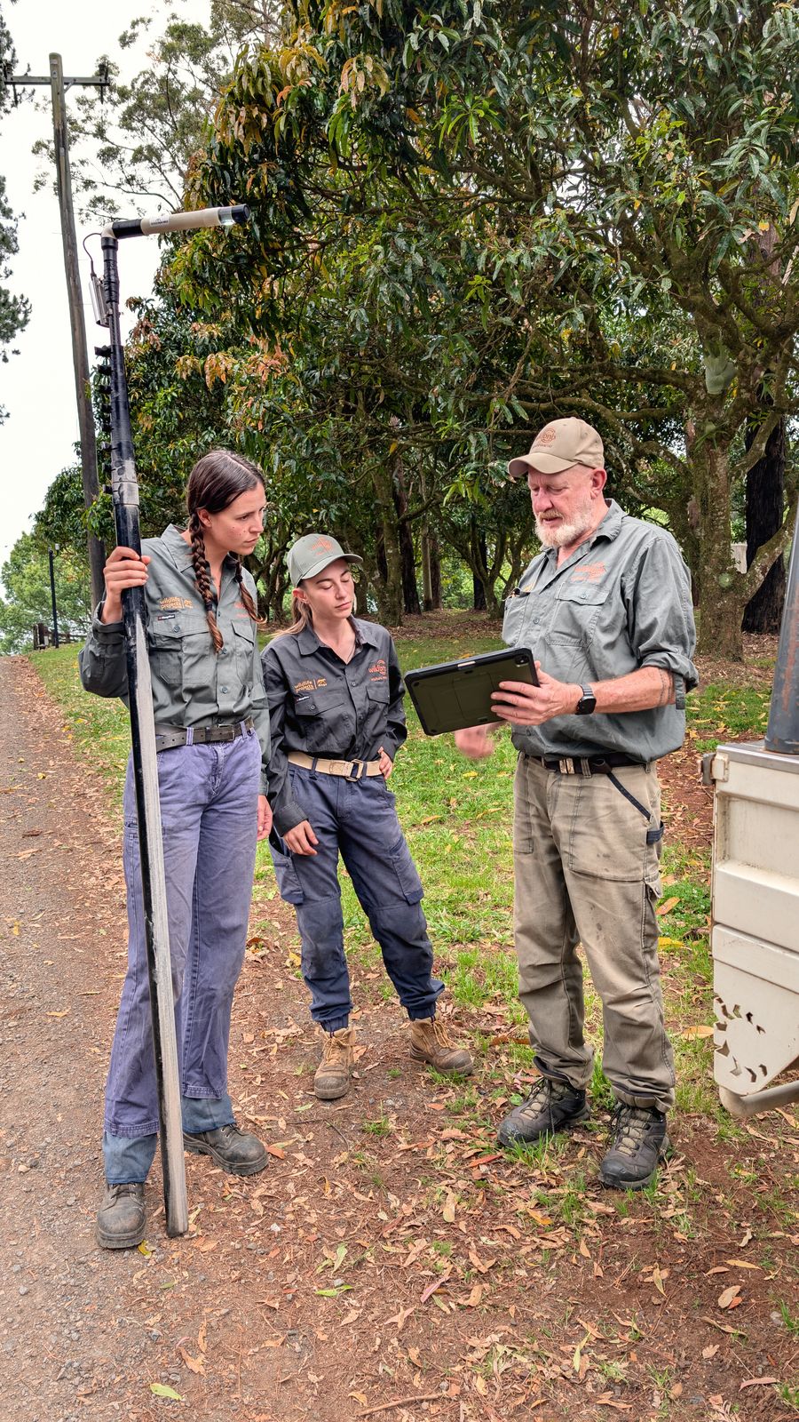 Wildbnb team with a pole camera during a monitoring round